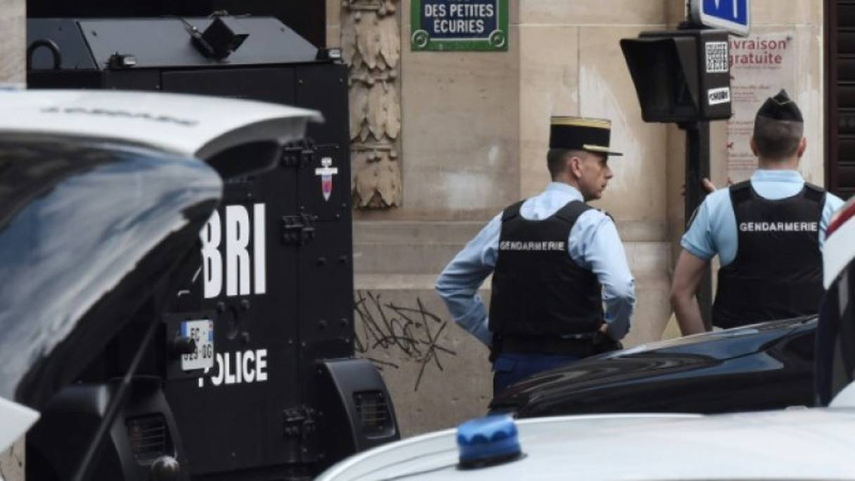 Gendarmes et hommes de la BRI  rue des Petites écuries à Paris le 12 juin 2018.
