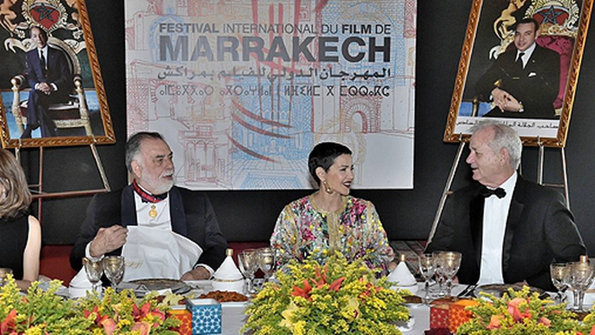 La princesse Lalla Meryem en discussion avec le comédien américain Bill Murray (à droite), en présence avec le réalisateur de "Conversations" (prix Cannes), Francis Ford Coppola.
