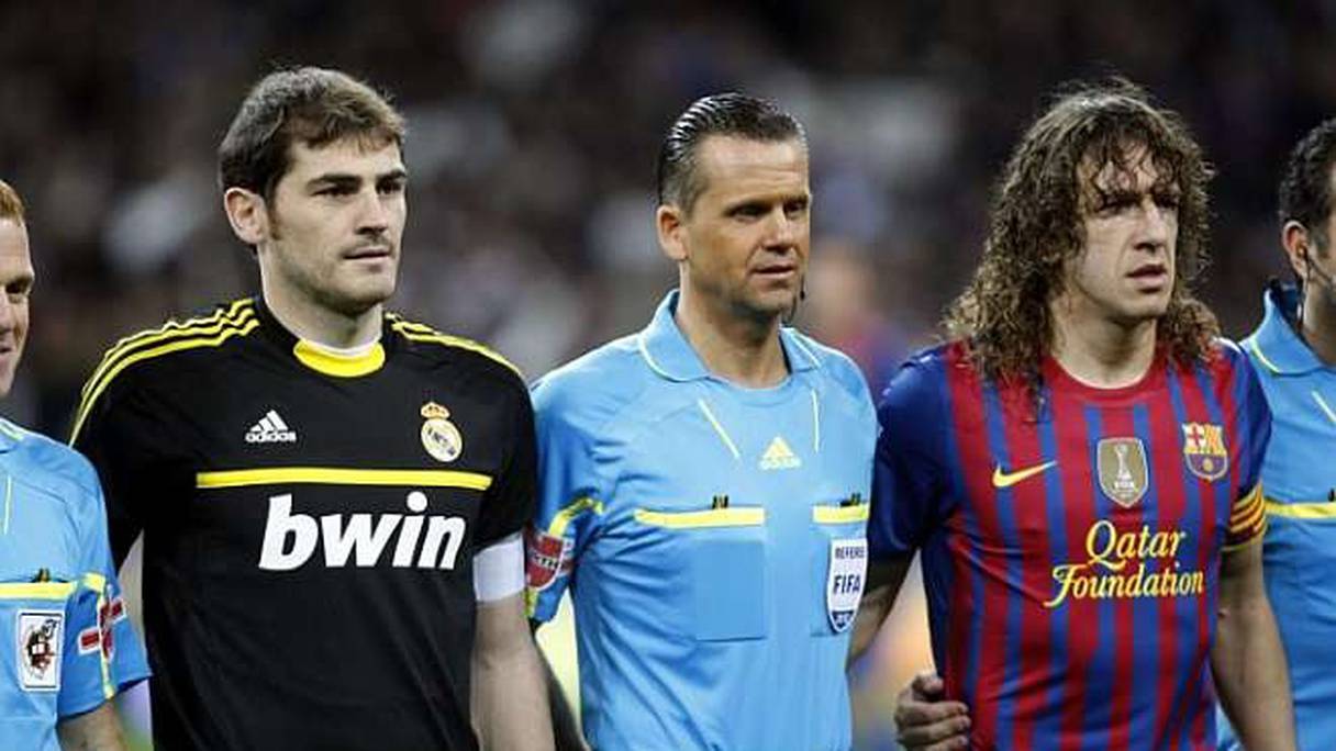 Iker Casillas et Carles Puyol lors d'un clasico Real-Barça.
