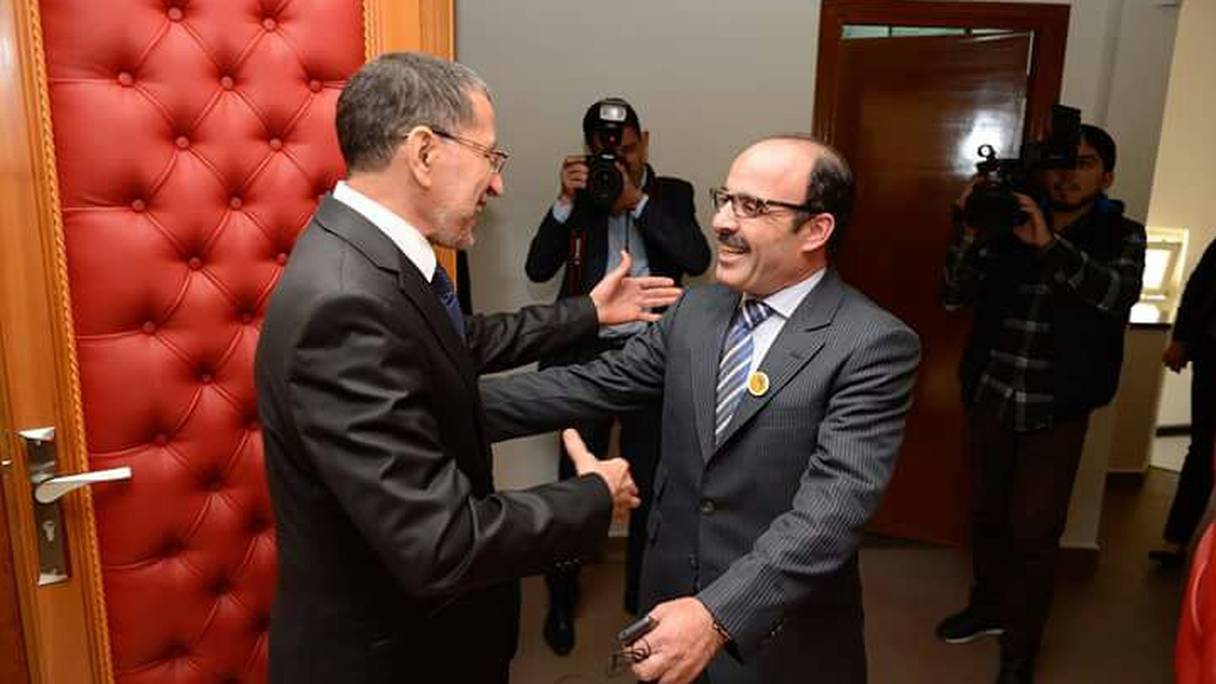 Saâd-Eddine El Othmani recevant, en mars, Ilyas El Omari, SG du PAM, au siège central du PJD à Rabat. 
