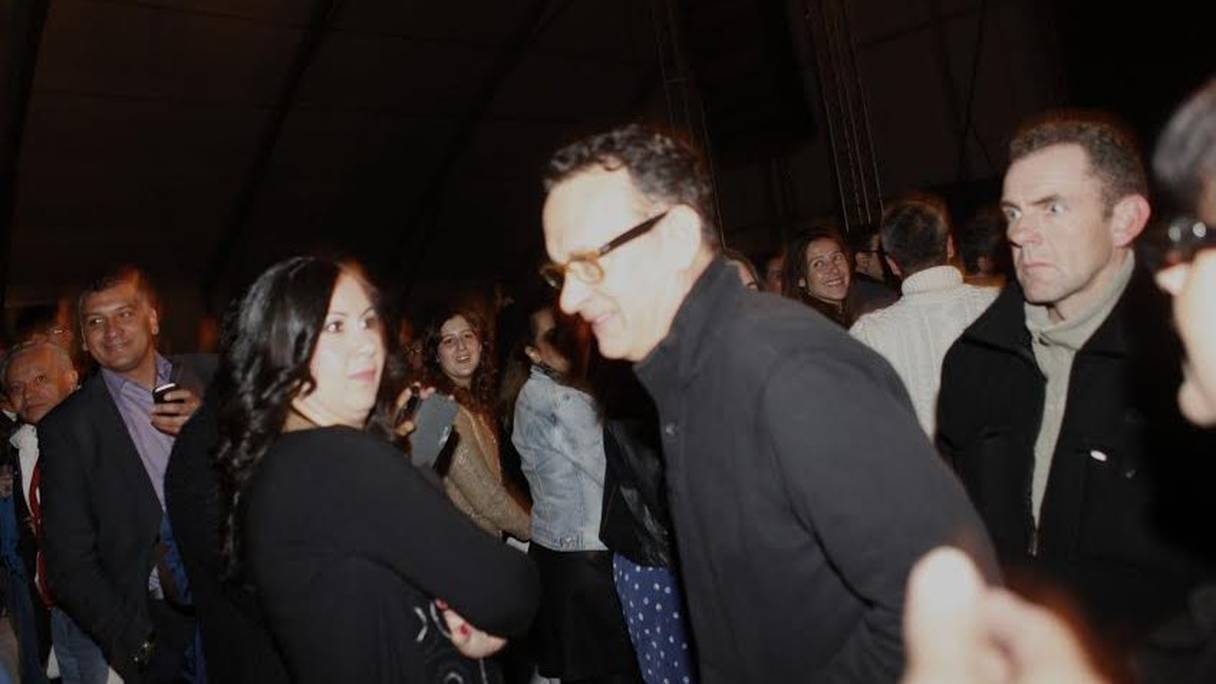 Tom Hanks ravi d'être au concert de Patti Smith.
