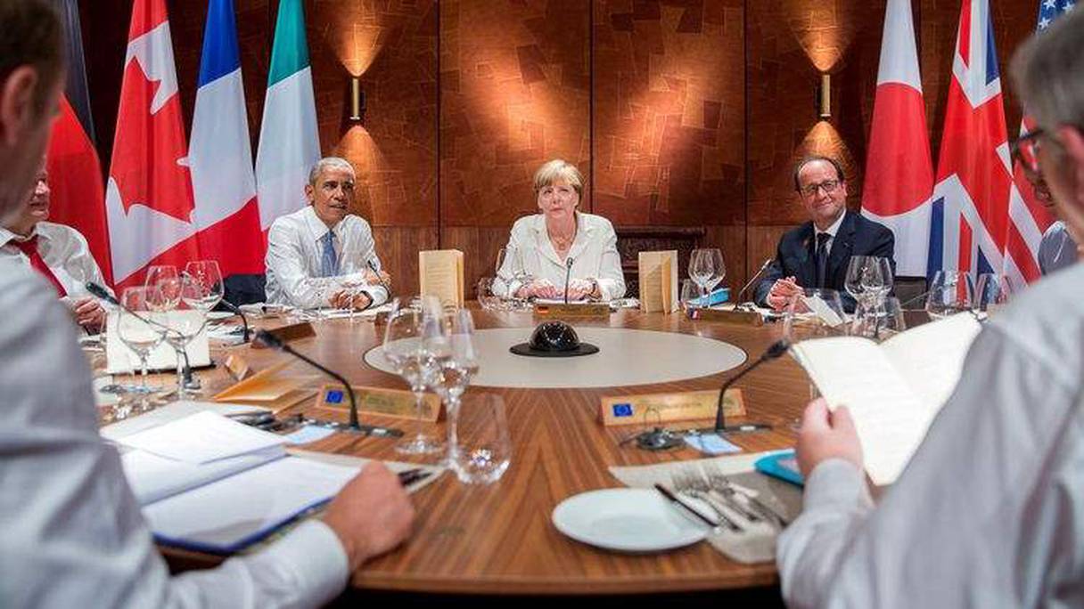 Angela Merkel, Barack Obama et François Hollande lors d'un dîner de travail au sommet du G7, le 7 juin 2015.
