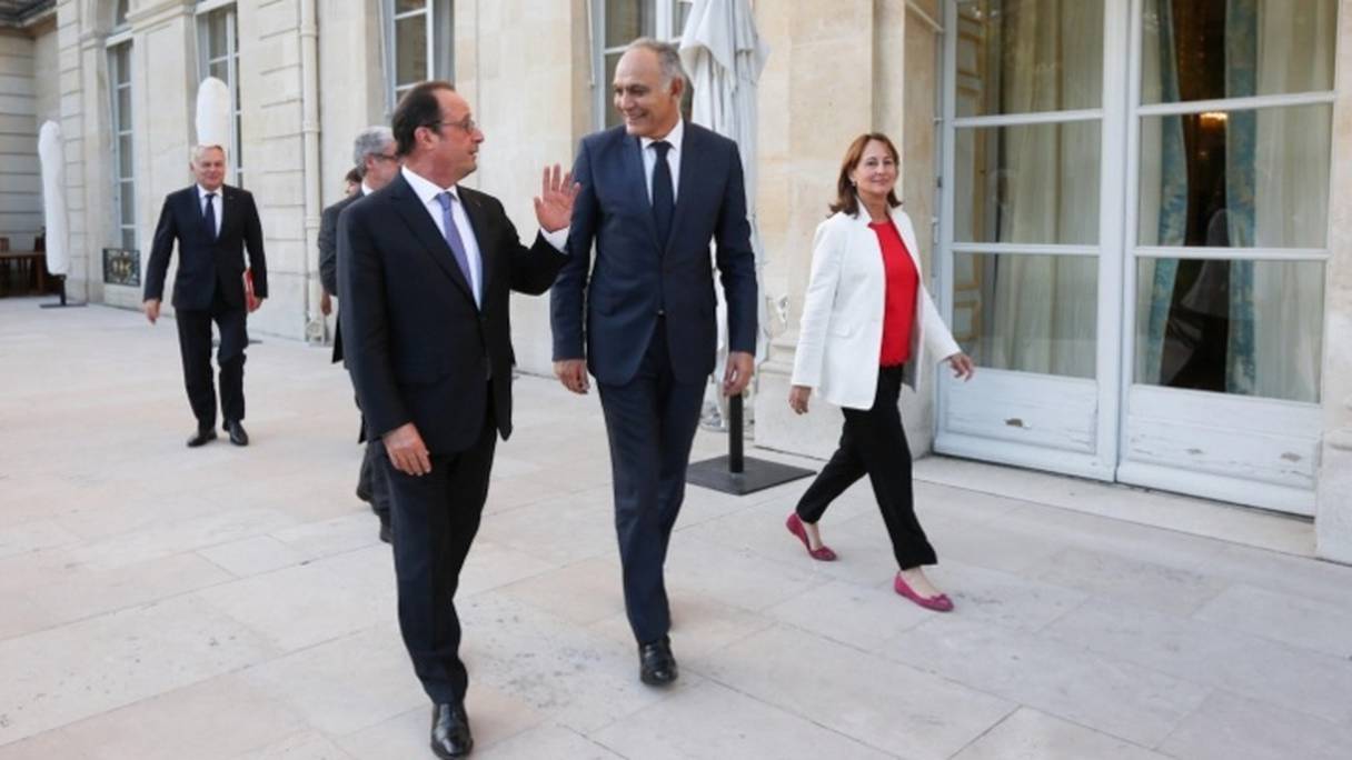 Le président François Hollande avec Salaheddine Mezouar, président du comité de pilotage de la COP22, le 9 septembre à Paris.
