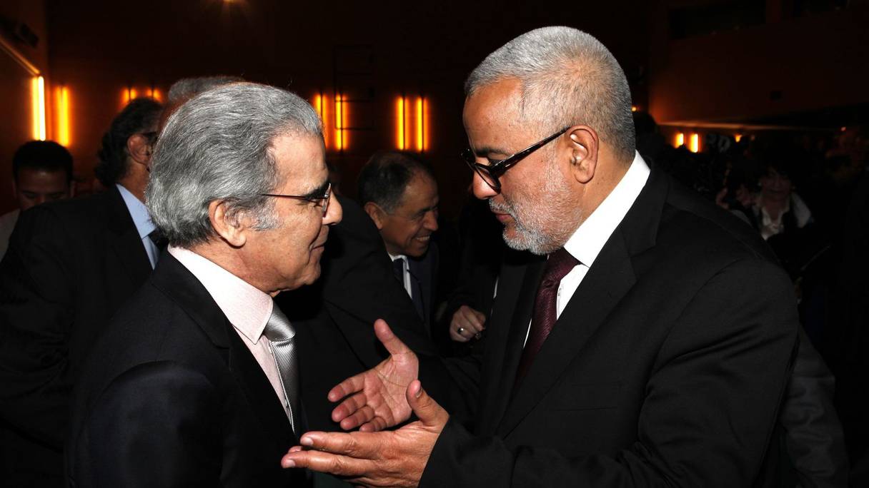 Abdellatif Jouahri, gouverneur de Bank Al-Maghrib, et Abdelilah Benkirane, chef du gouvernement, lors des Assises de la fiscalité tenues en 2013.
