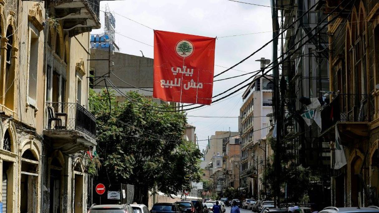 "Ma maison n'est pas à vendre", clame cette banderole dans un quartier de la capitale du Liban. 
