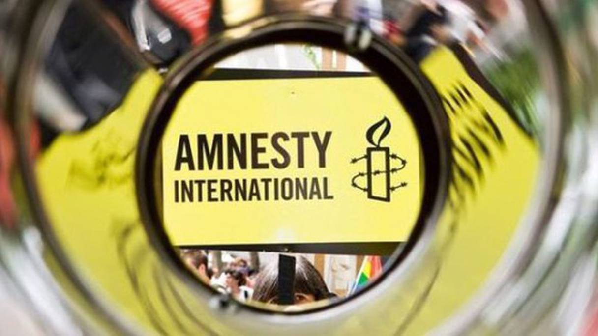 Logo d'Amnesty International. Photos d'illustration.
