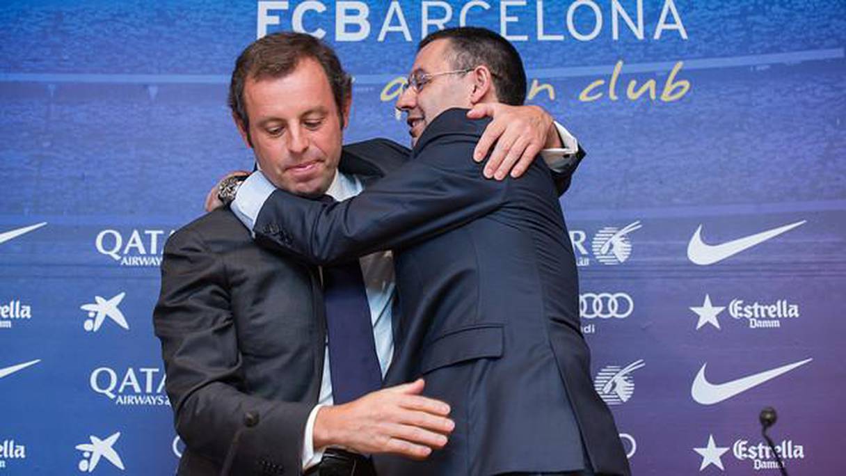 L'ancien président du Barça, Sandro Rosell à gauche et son successeur Josep Maria Bartomeu. 
