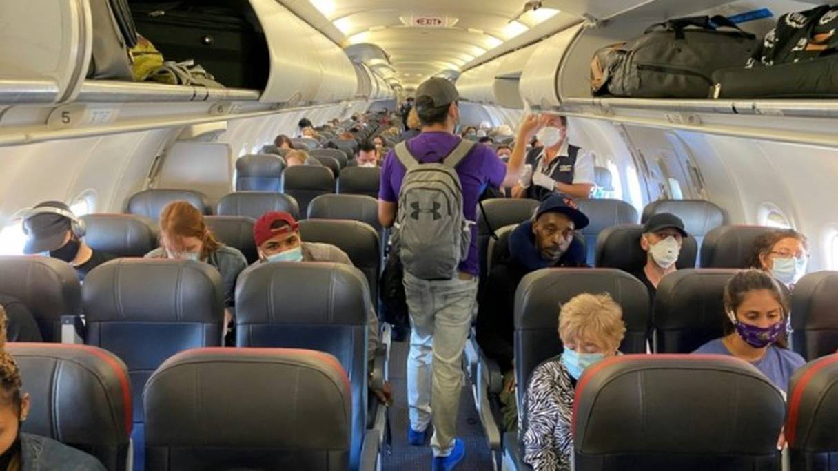 Des passagers à bord d'un vol American Airlines, aux Etats-Unis. 
