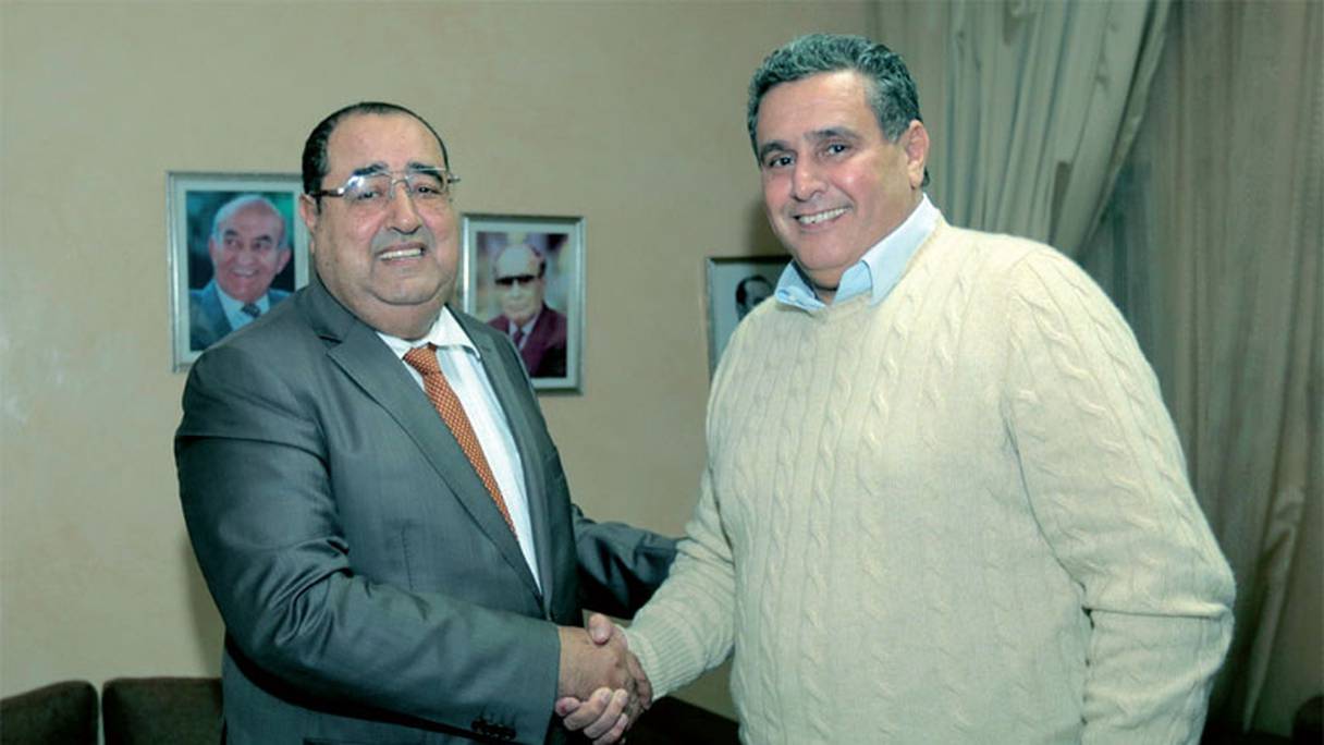 Aziz Akhannouch (président du RNI) et Driss Lachgar (premier secrétaire de l'USFP).
