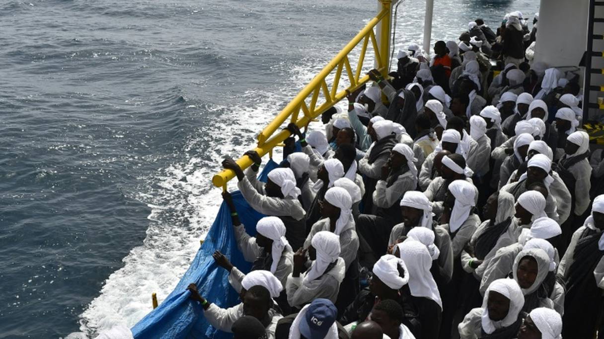 Des migrants à bord du bateau de secours "Aquarius", en Sardaigne, en Italie, le 26 mai 2016.
