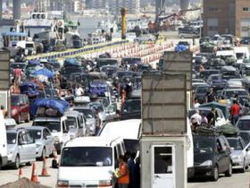 Vacanciers MRE en transit, au port d'Algesiras.