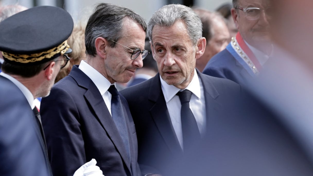 L'ancien président français Nicolas Sarkozy et le ministre de l'Intérieur Bruno Retailleau.