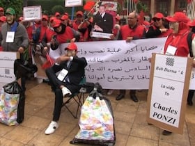 Les victimes escroquées dans le cadre de l'affaire Bab Darna, lors d'un précédent sit-in de protestation, devant le Parlement, à Rabat.
