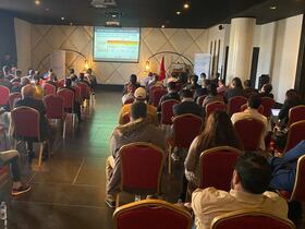 Plusieurs personnes assises dans une salle lors de la tournée de Bank Of Africa à Agadir, pour la présentation de la Loi de finances, vendredi 6 janvier 2023.