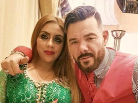 Le chanteur populaire Adil Miloudi et son épouse.