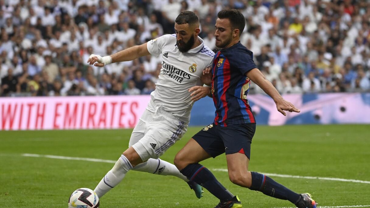 Karim Benzema et Eric Garcia lors du clasico, le 16 octobre 2022.
