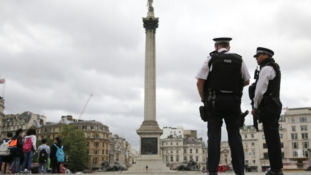 Des policiers montent la garde à Trafalgar Square, à Londres, le 4 août 2016.
