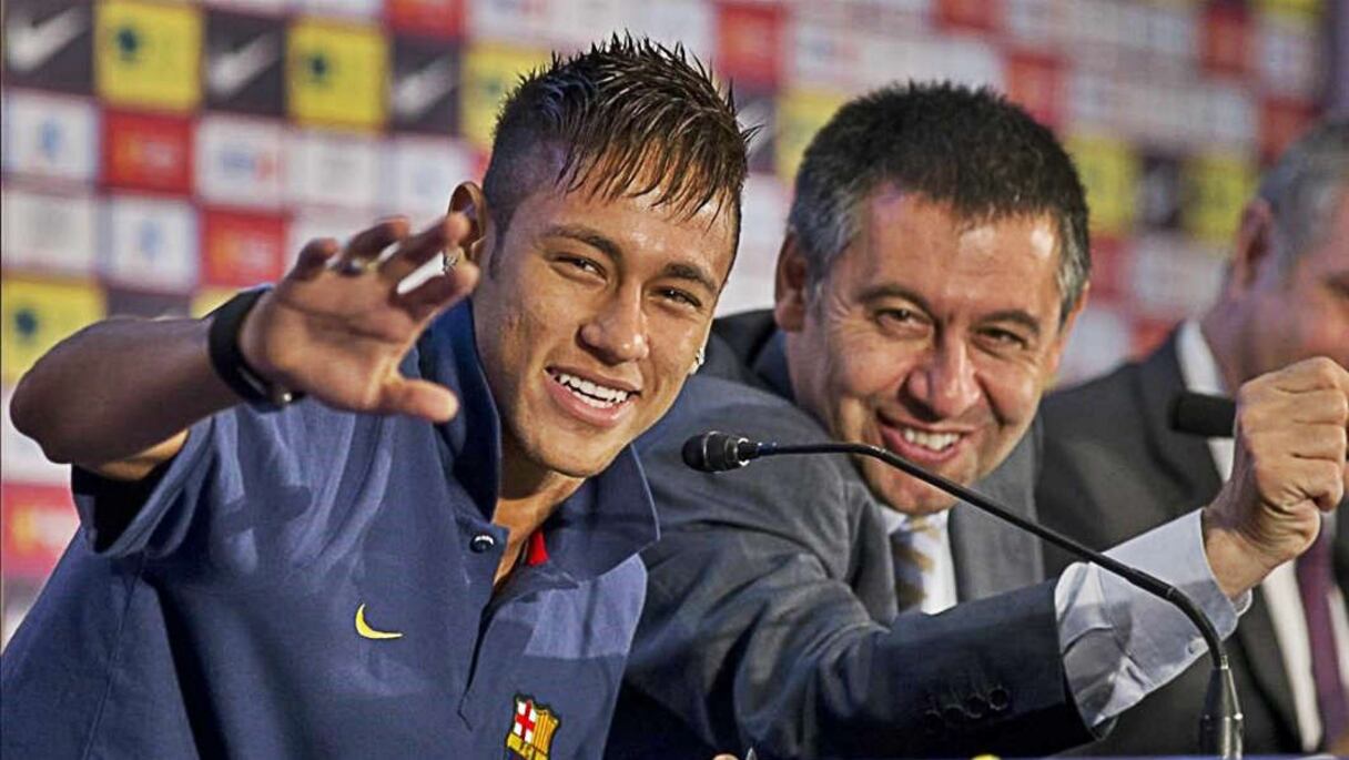 Le président du Barça, J. M. Bartomeu, et Neymar.
