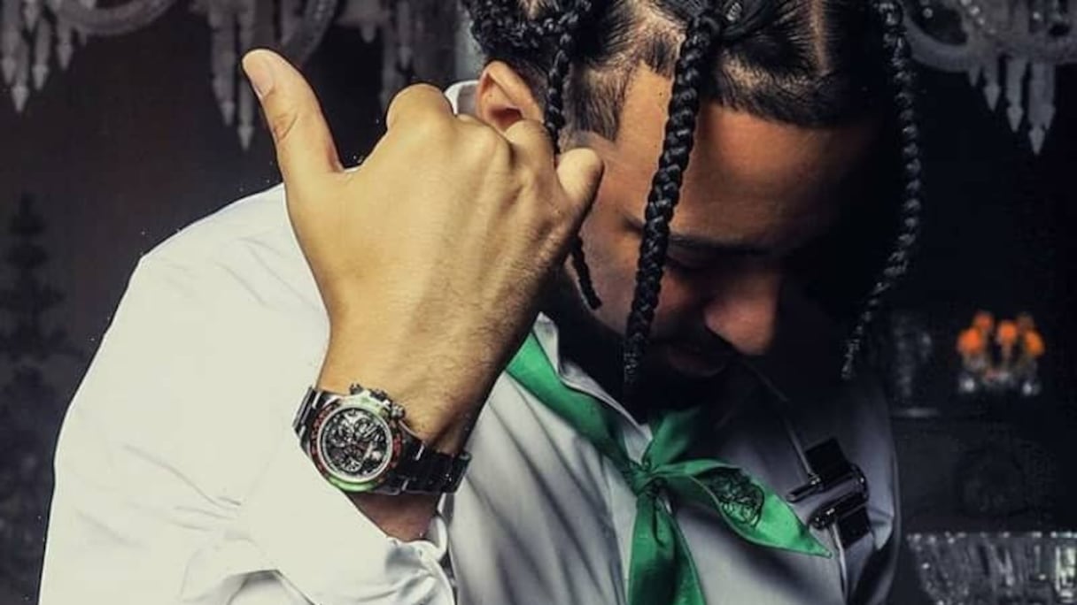 French Montana pose avec à son poignet, la "French Montana Concept", une Rolex Daytona customisée aux couleurs du Maroc.
