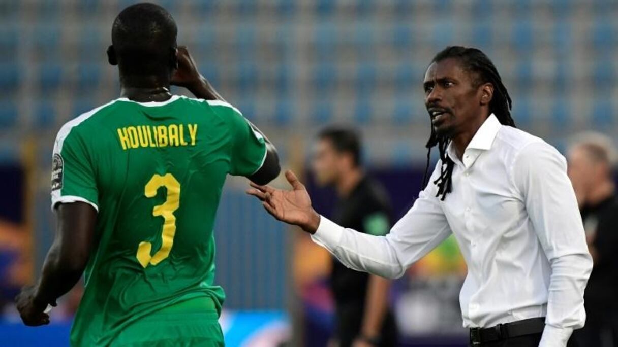 Le défenseur sénégalais Kalidou Koulibaly et son sélectionneur Aliou Cissé.
