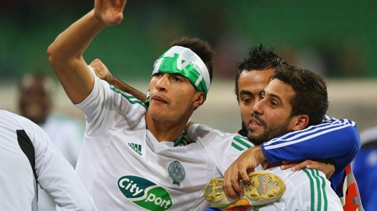Mohcine Metouali (d) célébrant la qualification pour les demi-finales de la Coupe du monde des clubs.
