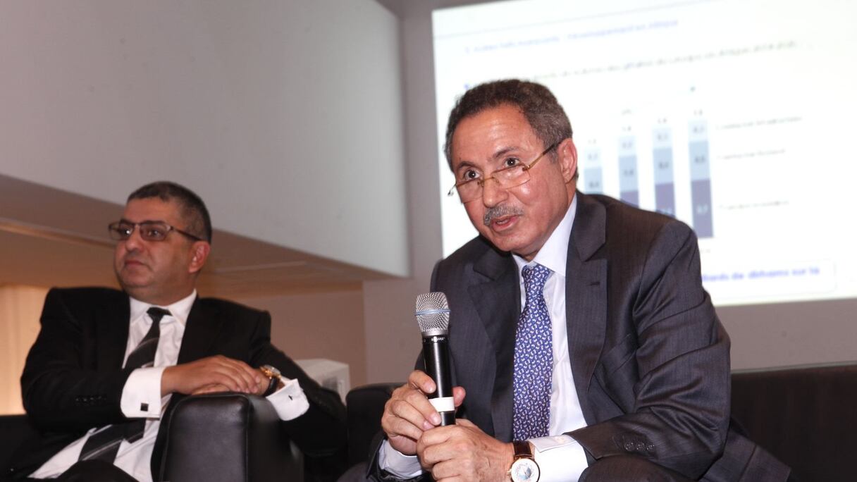 Alami Lazrak (d) et Karim Belmaachi (g), respectivement PDG et DG du groupe Alliances, lors de la présentation des résultats de l'exercice 2013.
