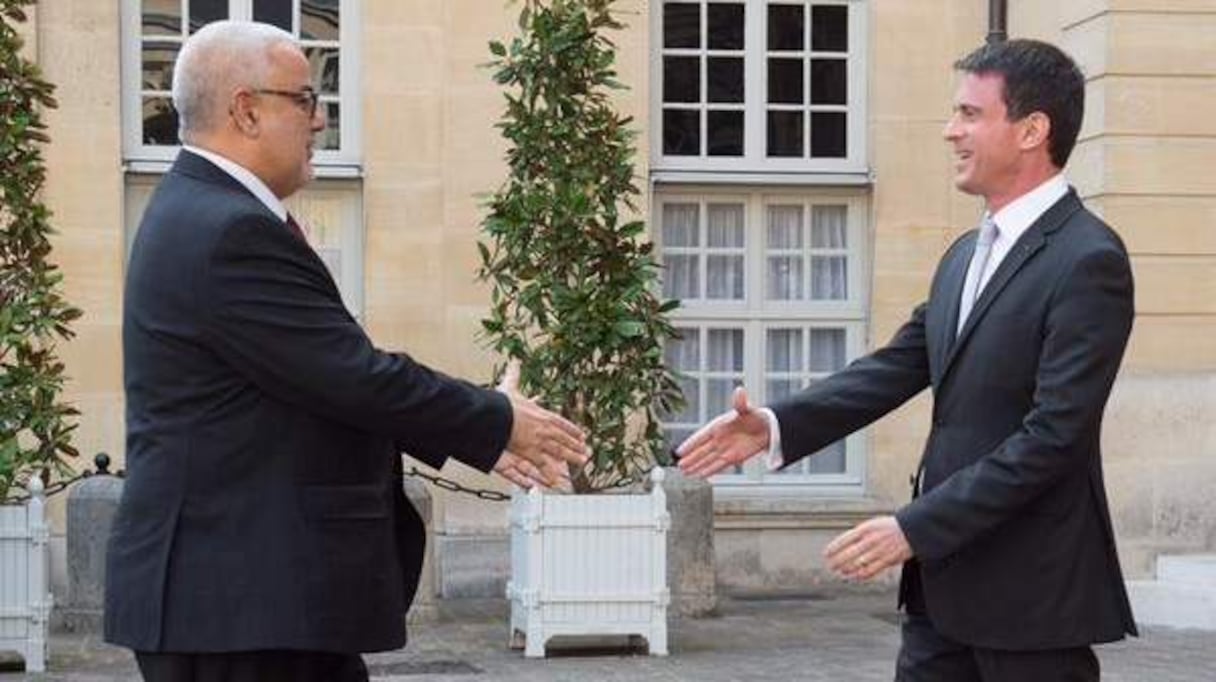 Poignée de main chaleureuse ce matin, à Matignon, entre Abdelillah Benkirane et Manuel Valls.
