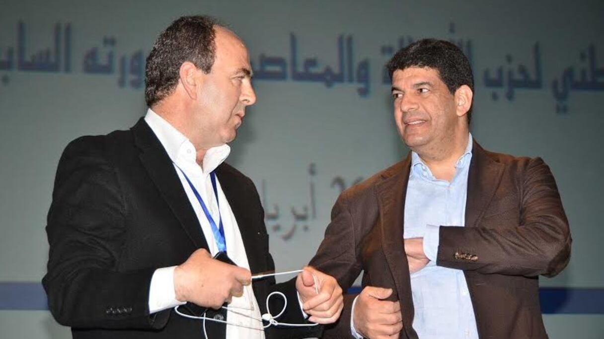 Hakim Benchemass, président du conseil national, et Mustapha Bakkoury, SG, lors de l'ouverture du 17e session du conseil national du PAM à Skhirat.