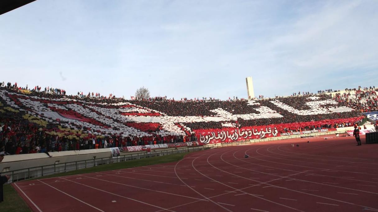 Les supporters du WAC avec ce magnifique tifo : "Absents, mais toujours dans nos cœurs les WINNERS". 
