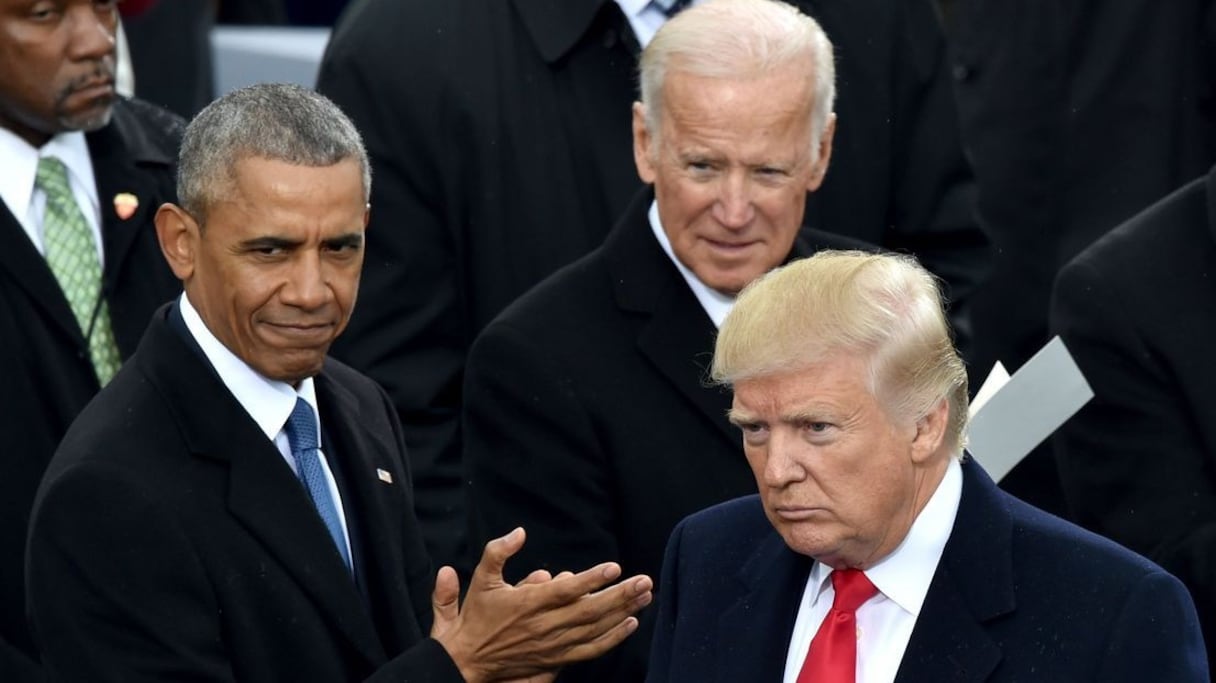 Barack Obama et Joe Biden à la cérémonie d'investiture de Donald Trump, au Capitole, à Washington, le 20 janvier 2017. 
