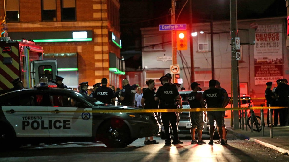 Sur les lieux de la fusillade, à Toronto, le 22 juillet.
