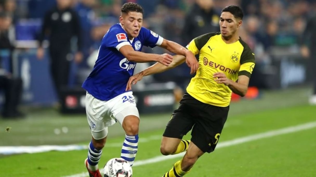 Les deux internationaux marocains, Amine Harit (Schalke 04) et Achraf Hakimi (Borussia Dortmund).
