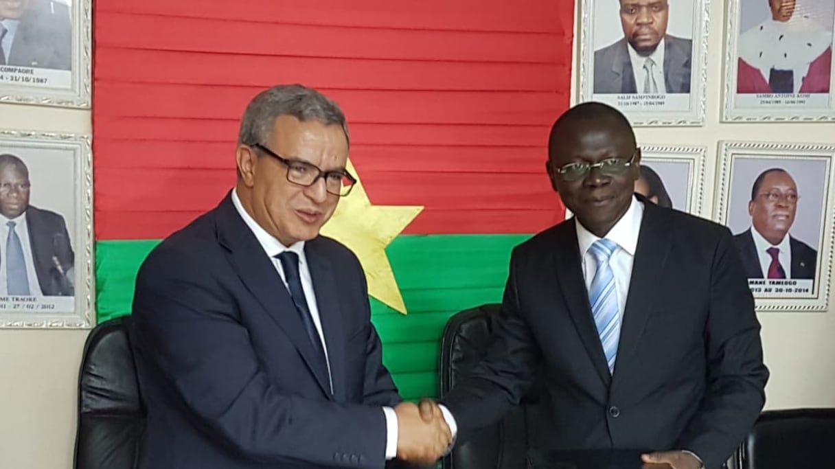 Le ministre de la Justice burkinabé, Bessolé René Bagoro, et son homologue marocain, Mohamed Aujjar.
