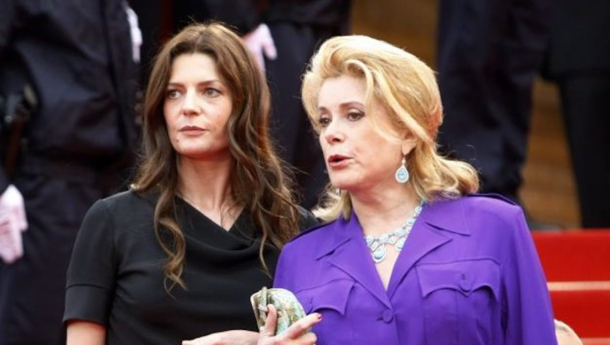 Catherine Deneuve et sa fille, à la Mostra de Venise. L'actrice française joue, aux côtés de Charlotte Gainsbourg, Benoît Poelvoorde et Chiara Mastroianni dans «Trois Coeurs», de Benoît Jacquot, en compétition officielle.
