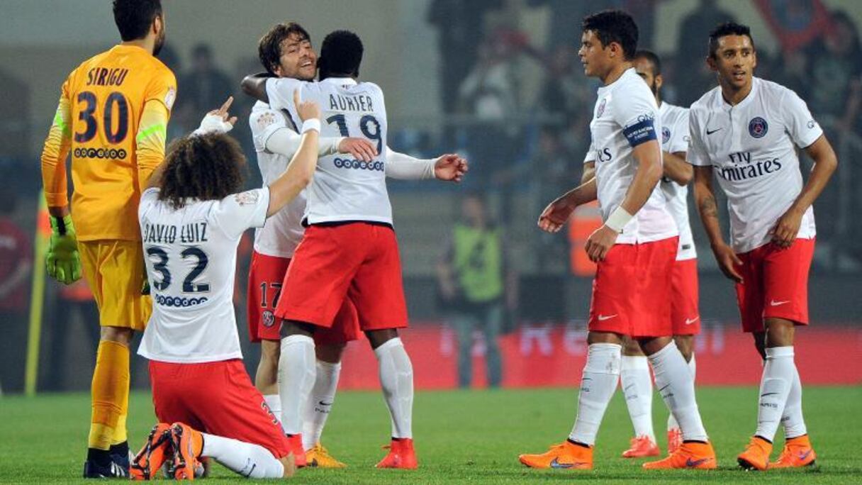 Les Parisiens exultent après la victoire du titre face à Montpellier, le 16 mai 2015 au stade de la Mosson.
