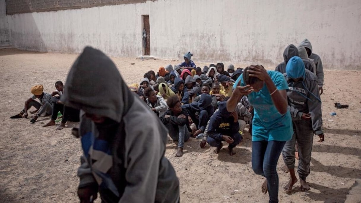 Migrants dans un camp en Lybie
