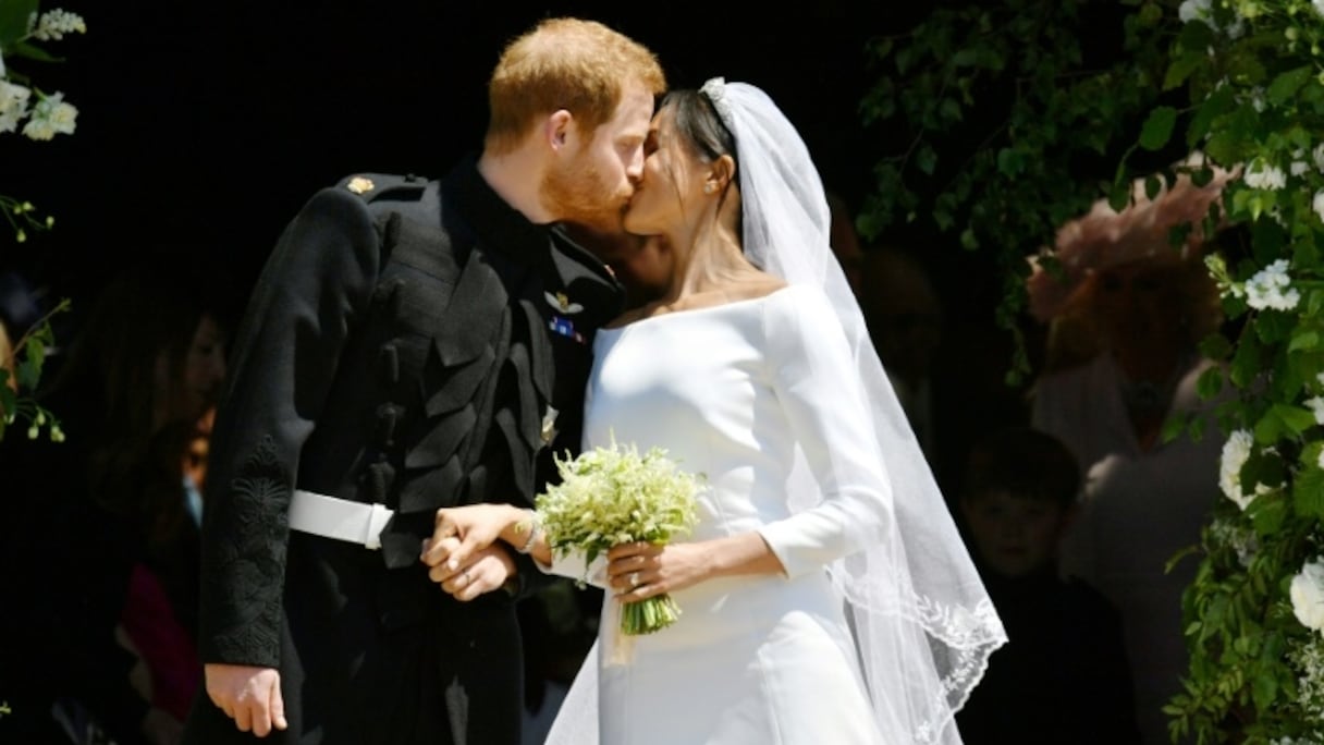 Le prince Harry et Meghan Markle quittent la chapelle St George de Windsor, le 19 mai 2018.
