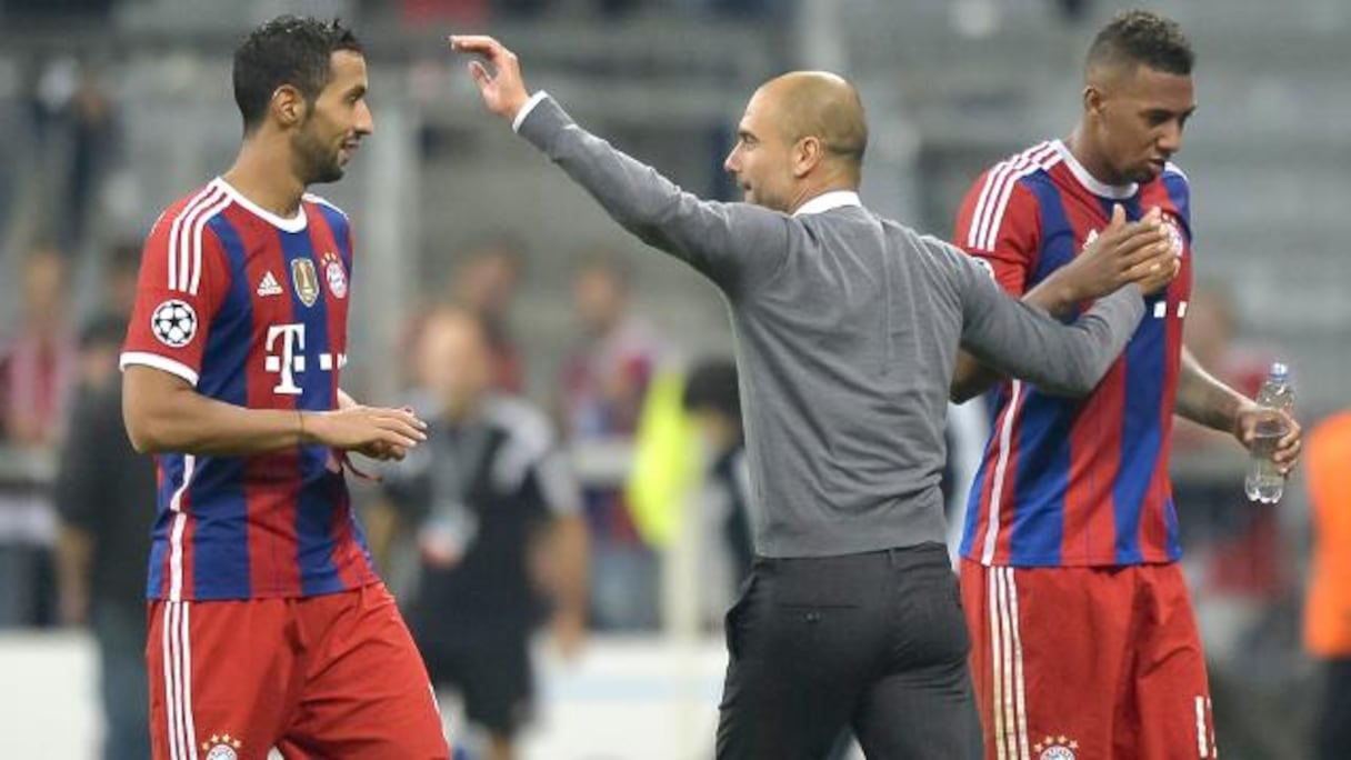 Mehdi Benatia, félicité par son coach Pep Guardiola. 
