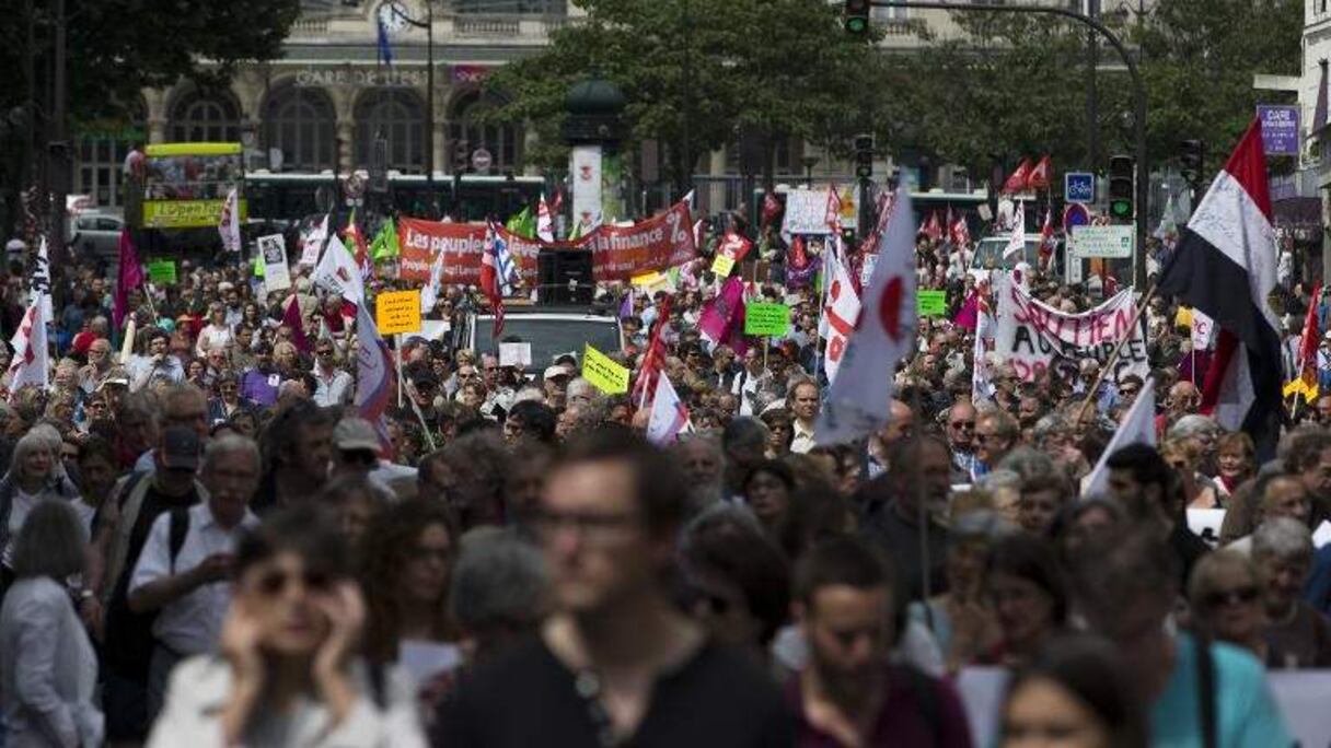 Marche de solidarité avec les migrants et contre les mesures exigées à la Grèce par ses créanciers, le 20 juin 2015 à Paris.
