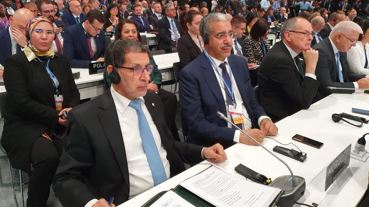 Saâd Eddine El Othmani et Aziz Rebbah, lors de la cérémonie d'ouverture de la COP25, à Madrid, lundi 2 décembre 2019. 
