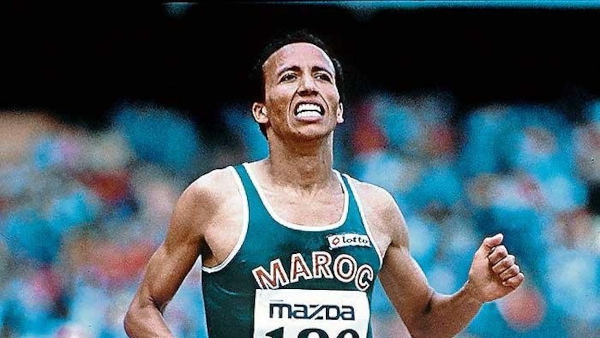 Spécialiste des épreuves de fond et demi fond. Vainqueur du 500 mètres des jeux olympiques de 1984 et des championnats du monde de 1987. L'athlète originaire de Kénitra, explosera tous les records du 1500 et 500 mètres 
