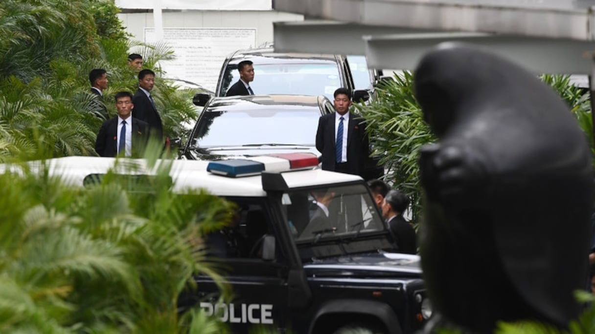 Le convoi du leader nord-coréen Kim Jong Un arrive à l'hôtel St Regis, le 10 juin 2018 à Singapour.
