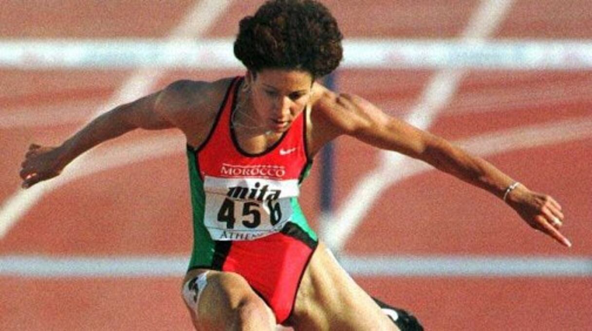 Spécialiste du 400 mètres haies, la marocaine sera championne du monde en 1997 et 2001 
