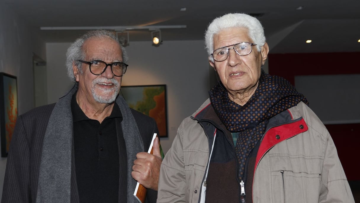 L'artiste peintre et directeur de l'école des Beaux-Arts de Casablanca, M. Rahoul, en compagnie de l'artiste peintre Hamidi. 
