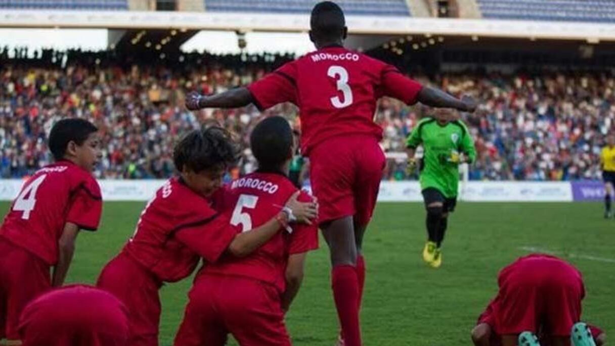 Les Lionceaux de l'Atlas jubilent après leur victoire finale.

