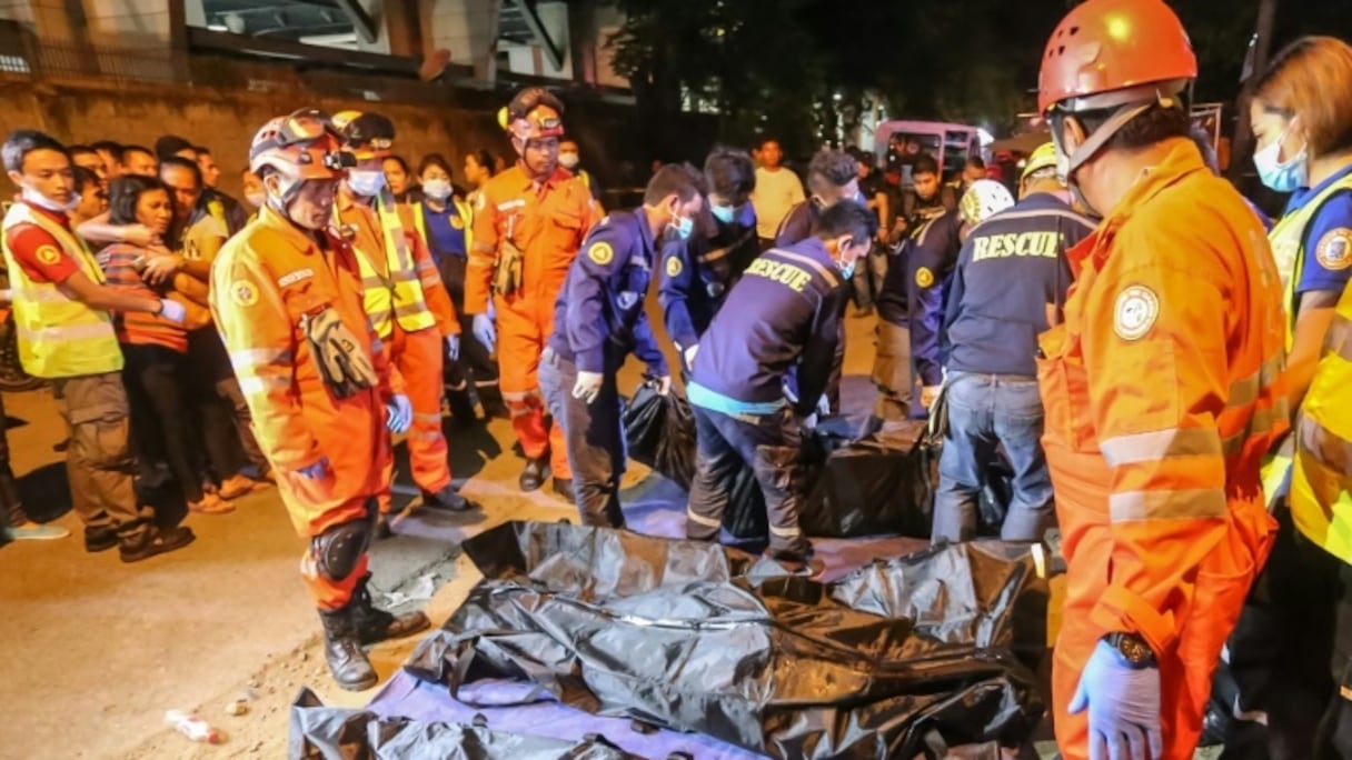 Des secouristes sur les lieux de l'attentat à Davao, aux Philippines, le 3 septembre 2016.
