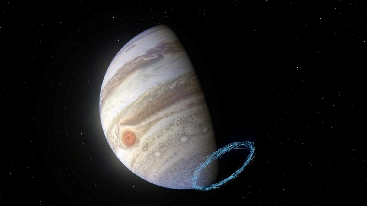 Impression d'artiste publiée par l'Observatoire européen austral (ESO) le 18 mars 2021 qui montre les lignes bleues, au pôle Sud, représentant la vitesse du vent, sur une image réelle de Jupiter, prise par l'imageur JunoCam à bord du vaisseau spatial Juno de la NASA.
