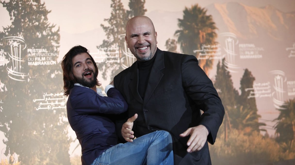 L'acteur Omar Lotfi et Mohamed Kaissi miment avec humour une scène de combat au festival du film de Marrakech. 
