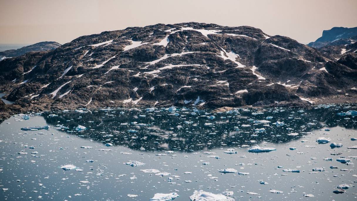 Des icebergs flottent le long de la côte est du Groenland, près de Kulusuk, le 15 août 2019. La faim, la sécheresse et les maladies affecteront des dizaines de millions de personnes supplémentaires d'ici quelques décennies, selon l'ONU, à cause du réchauffement de la terre.
